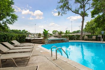 Swimming pool with lounge chairs